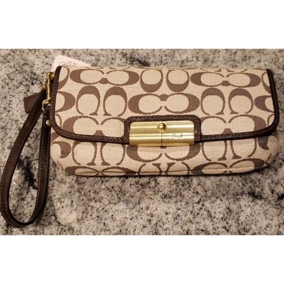 Coach Handbags - NWT NEW COACH KRISTEN Signature Logo Brown Wristlet Clutch Bag 45094